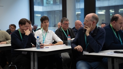 Participants discuss topics and vote on proposals.