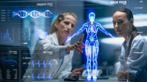 Two scientists discuss an x-ray of a patient